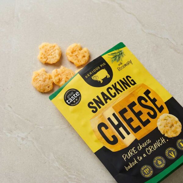 serious pig snacking cheese