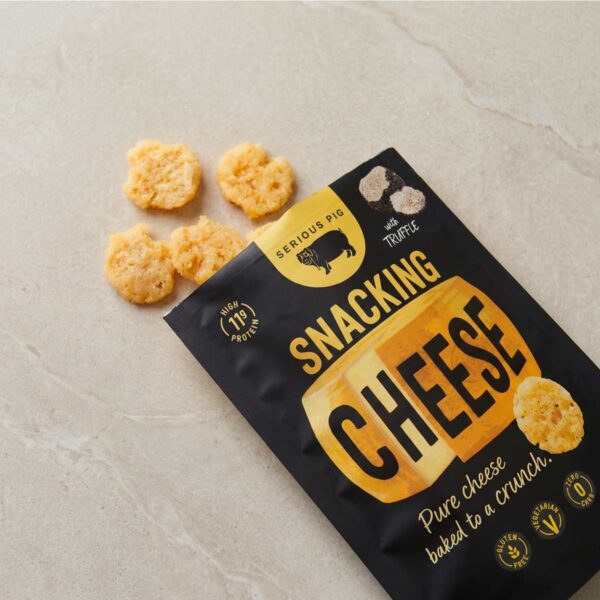 serious pig snacking cheese