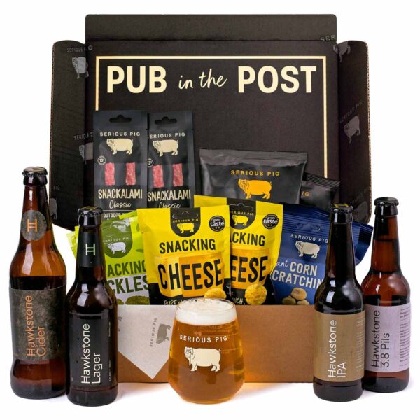The ultimate beer lover's gift! Hawkstone brewery beers from Clarkson's Farm paired with award-winning Serious Pig snacks. Includes 4 craft beers, quality glass & 8 gourmet snacks. Perfect pub-in-a-box gift.